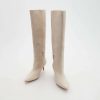 Bottes à talon en cuir bout pointu
