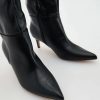 Bottes à talon en cuir bout pointu
