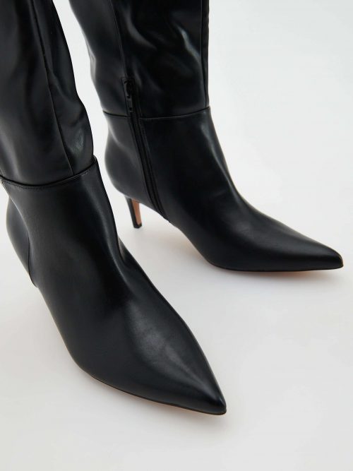 Bottes à talon en cuir bout pointu