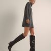Bottes à talon en cuir bout pointu