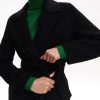 Manteau long ceinturé